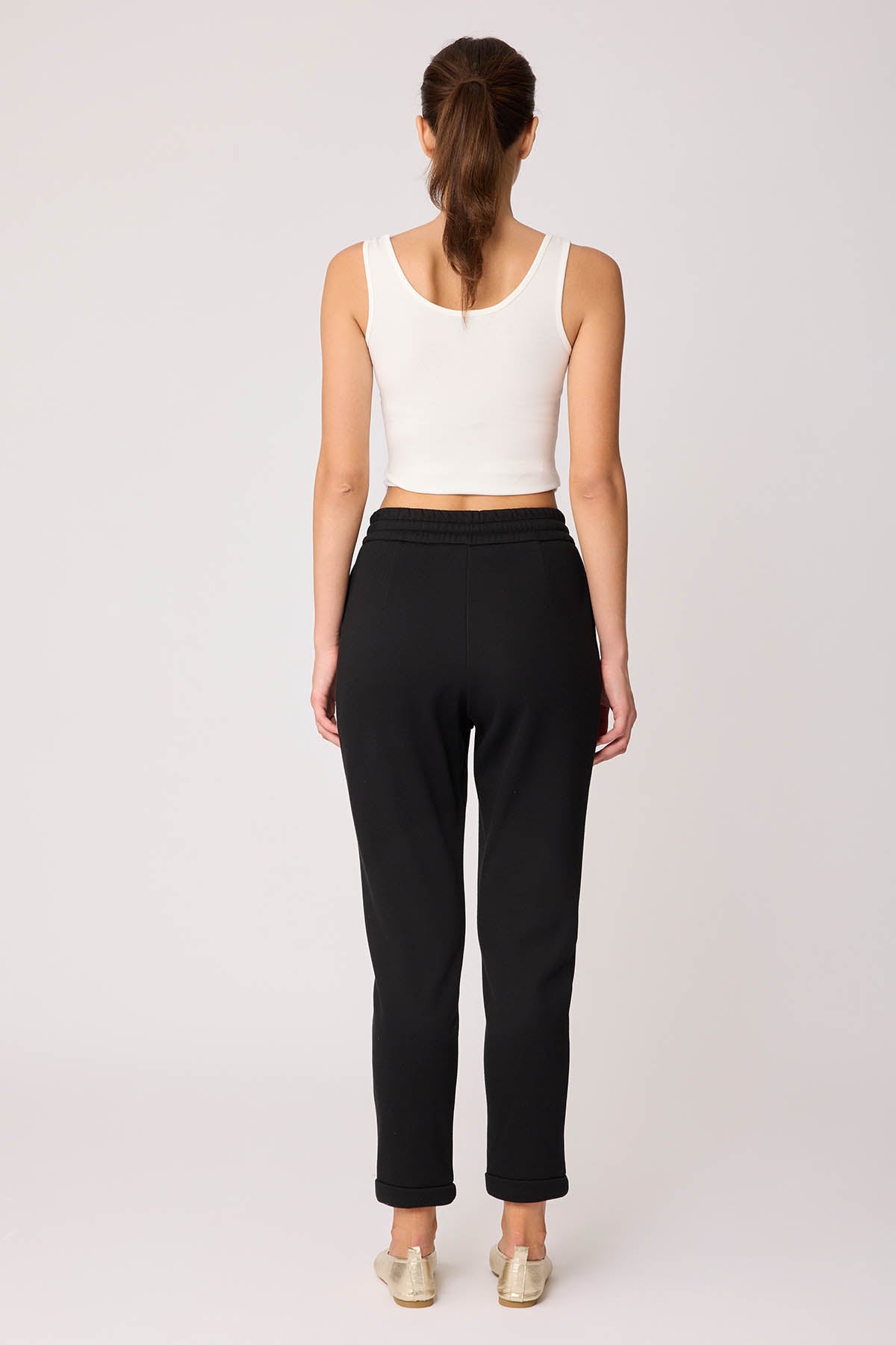 TRACKSUIT TROUSERS WITH LACED POCKETS