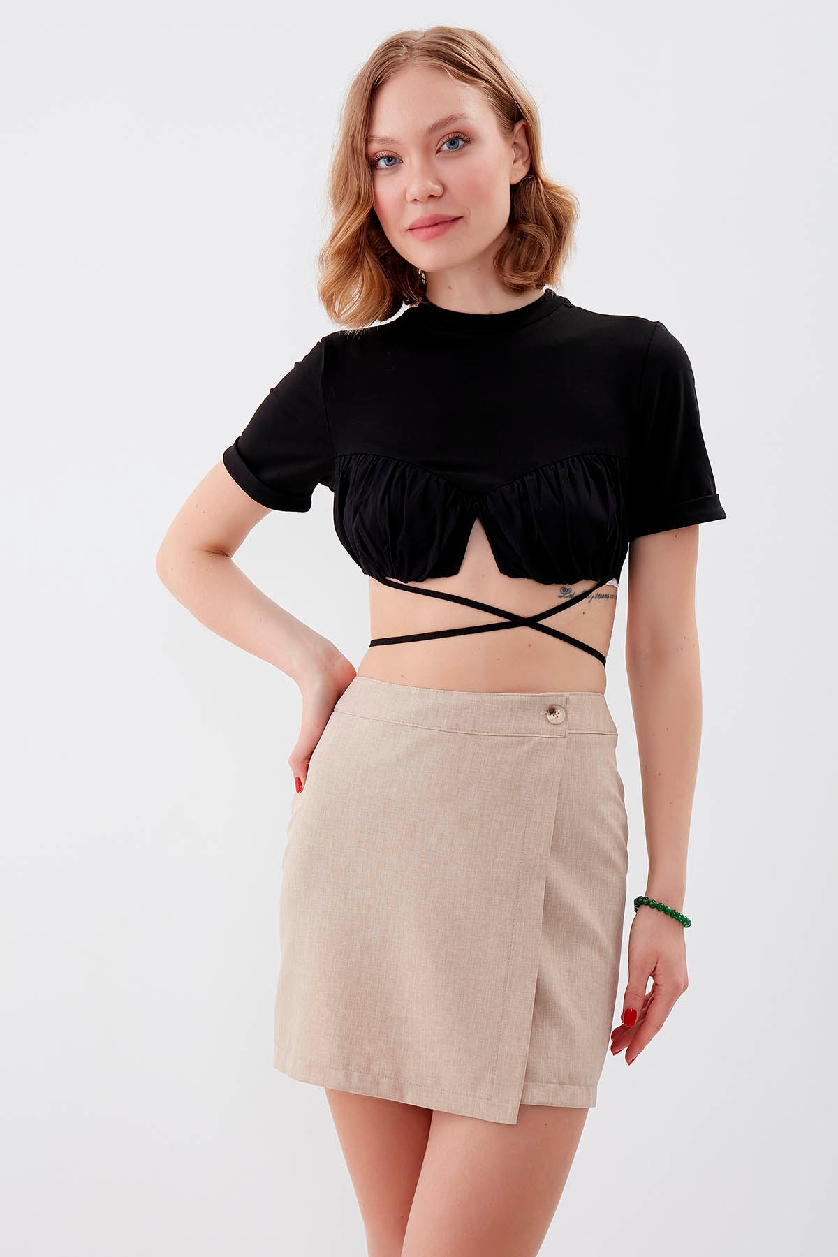 MINI-SKIRT WITH BUTTON