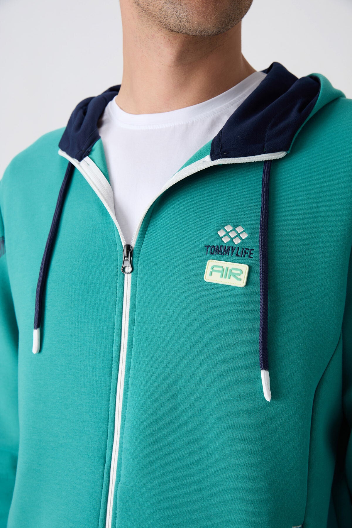 Tracksuit with a sea-green, indigo cotton fabric