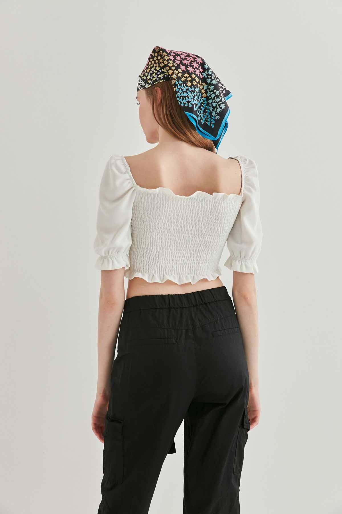 COILED FRONT DRAWSTRING TROJAN SLEEVE BLOUSE
