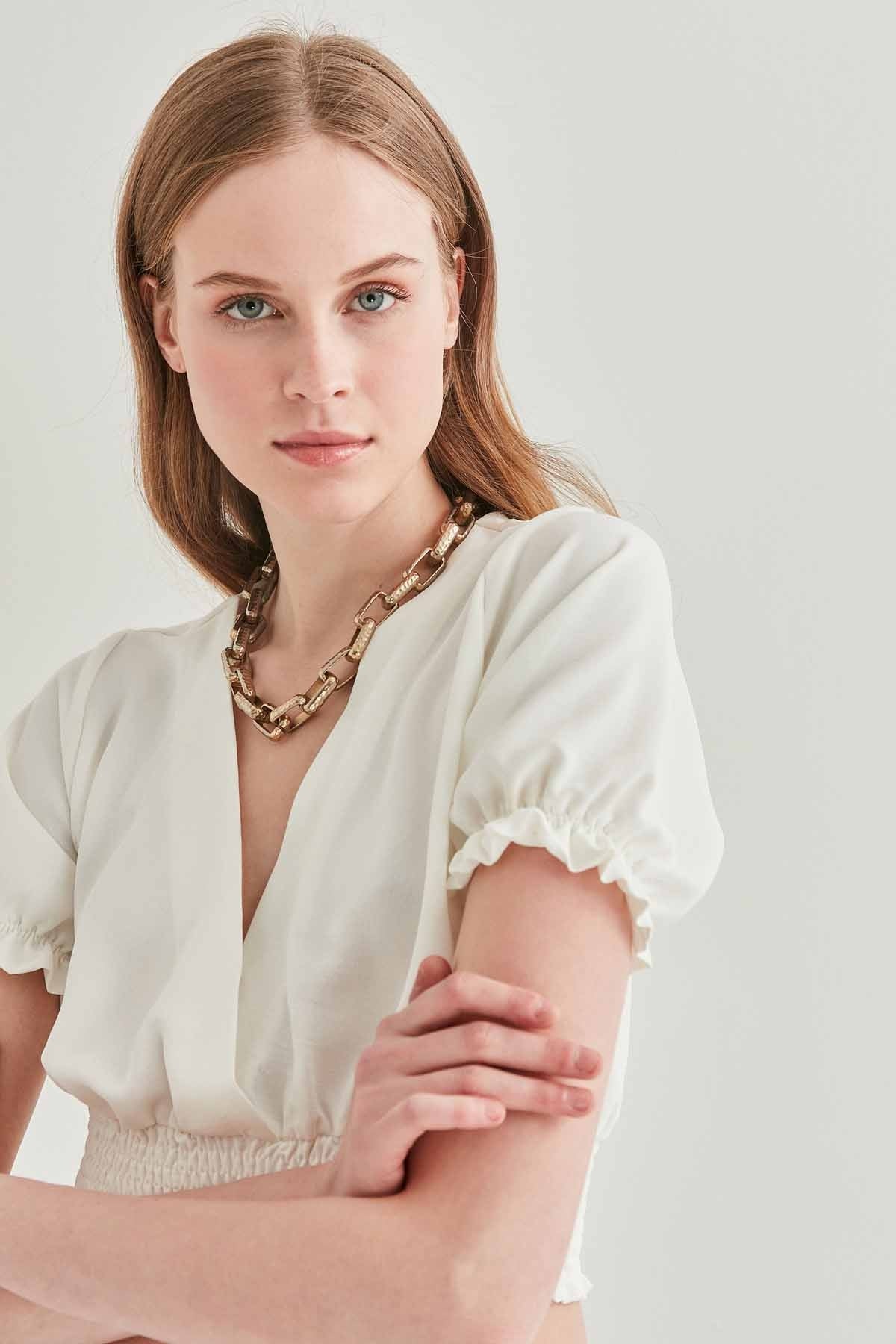 COILED BLOUSE