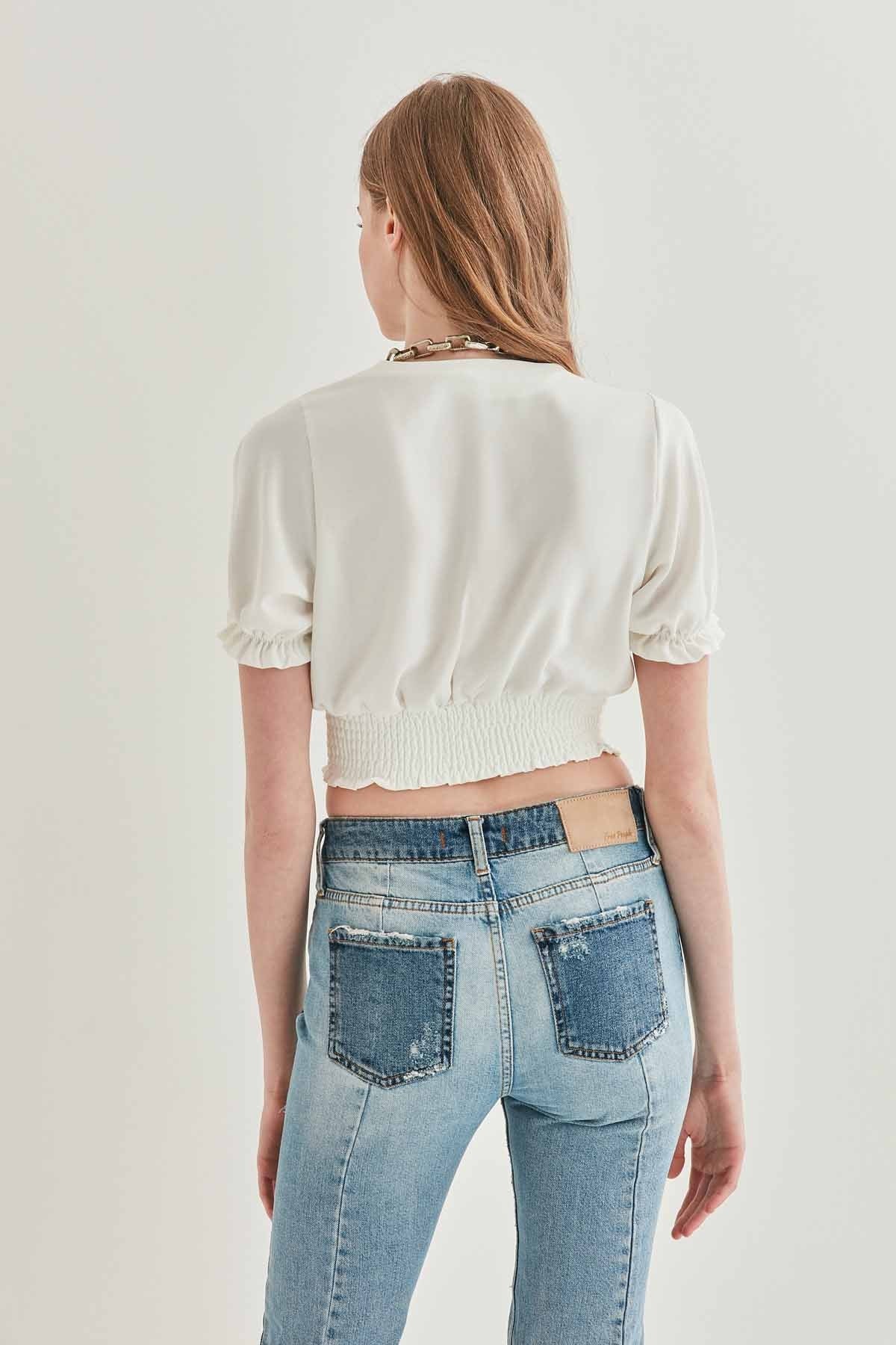 COILED BLOUSE