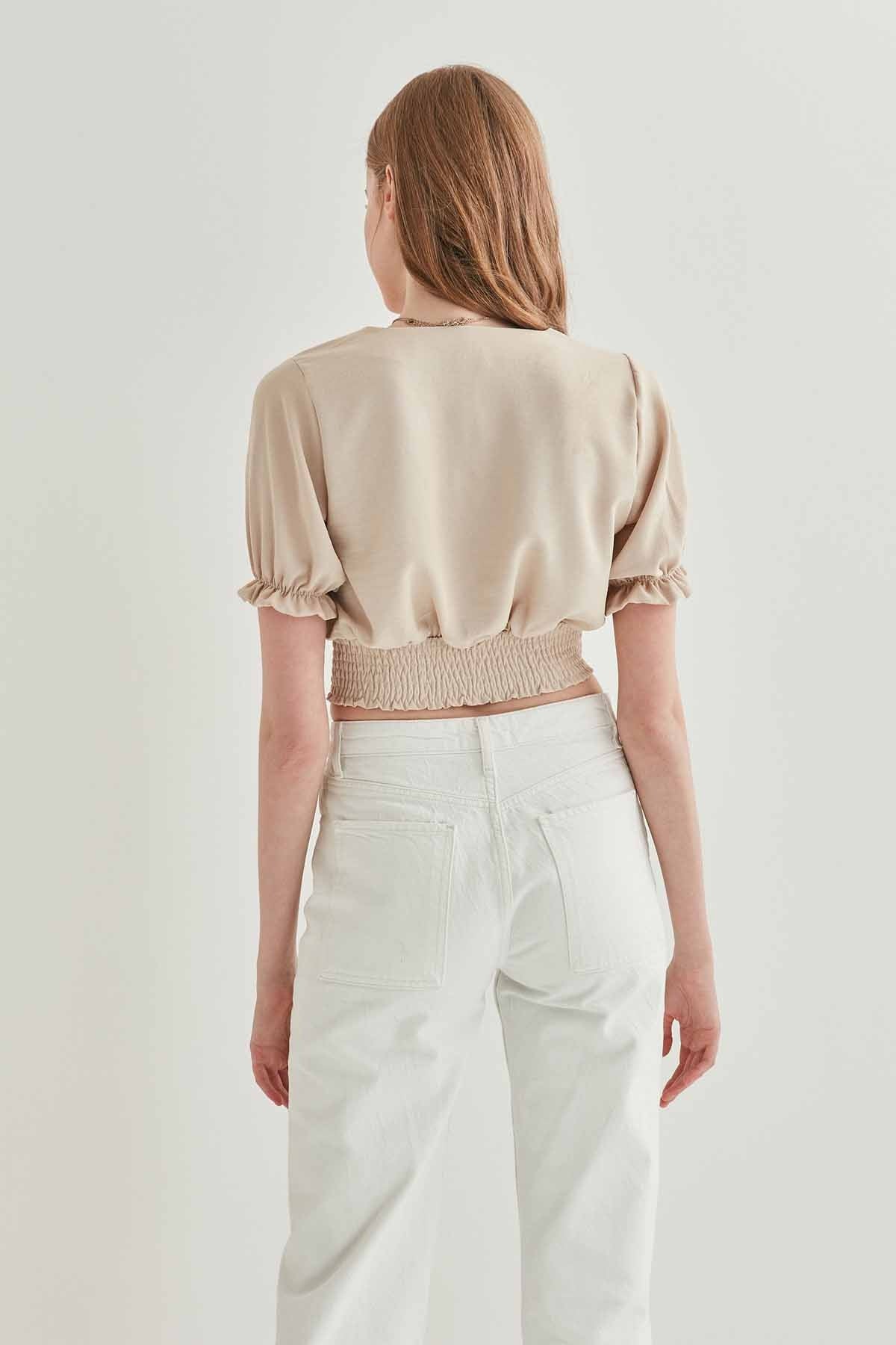 COILED BLOUSE