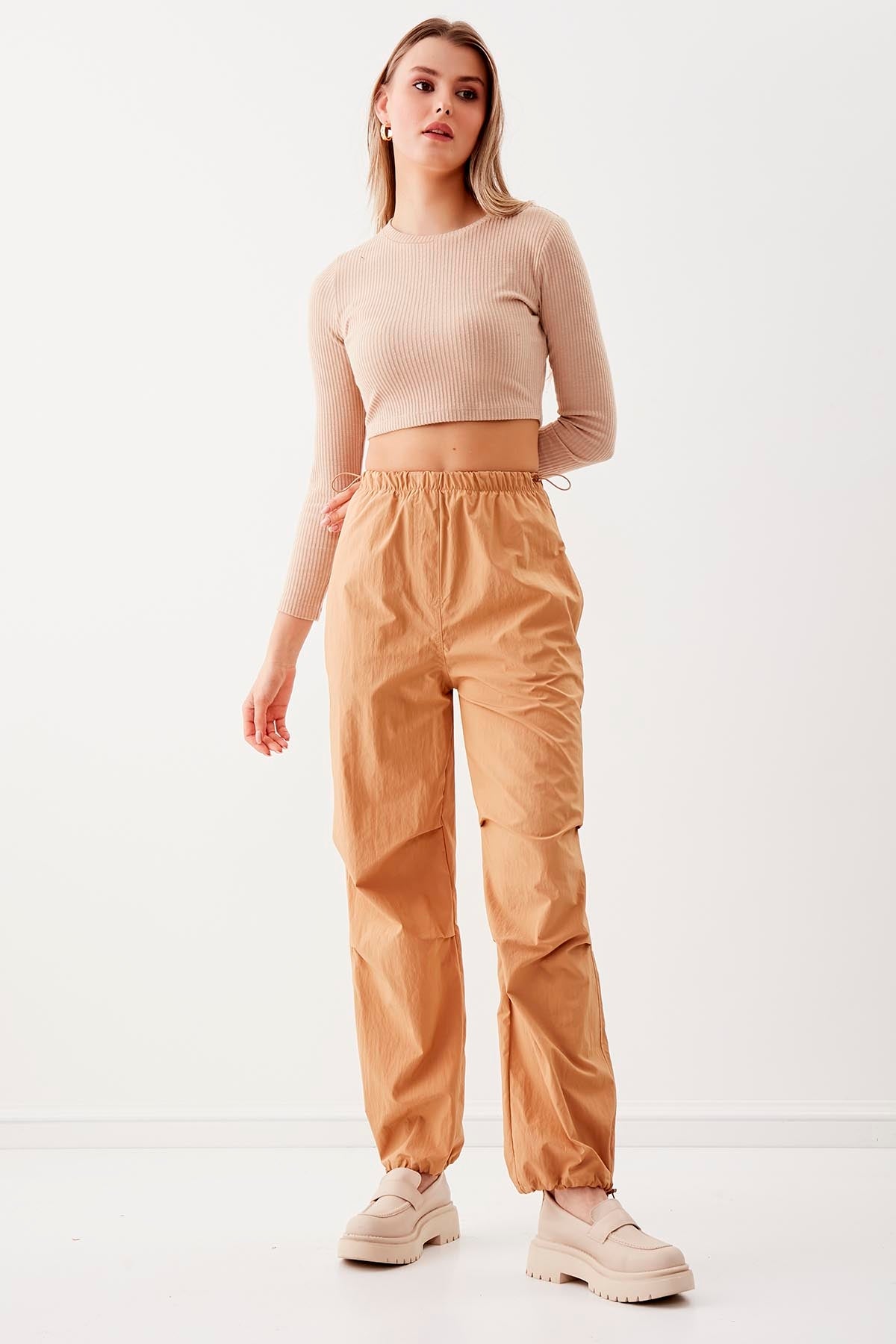 RUBBER-DETAILED PARACHUTE FABRIC TROUSERS