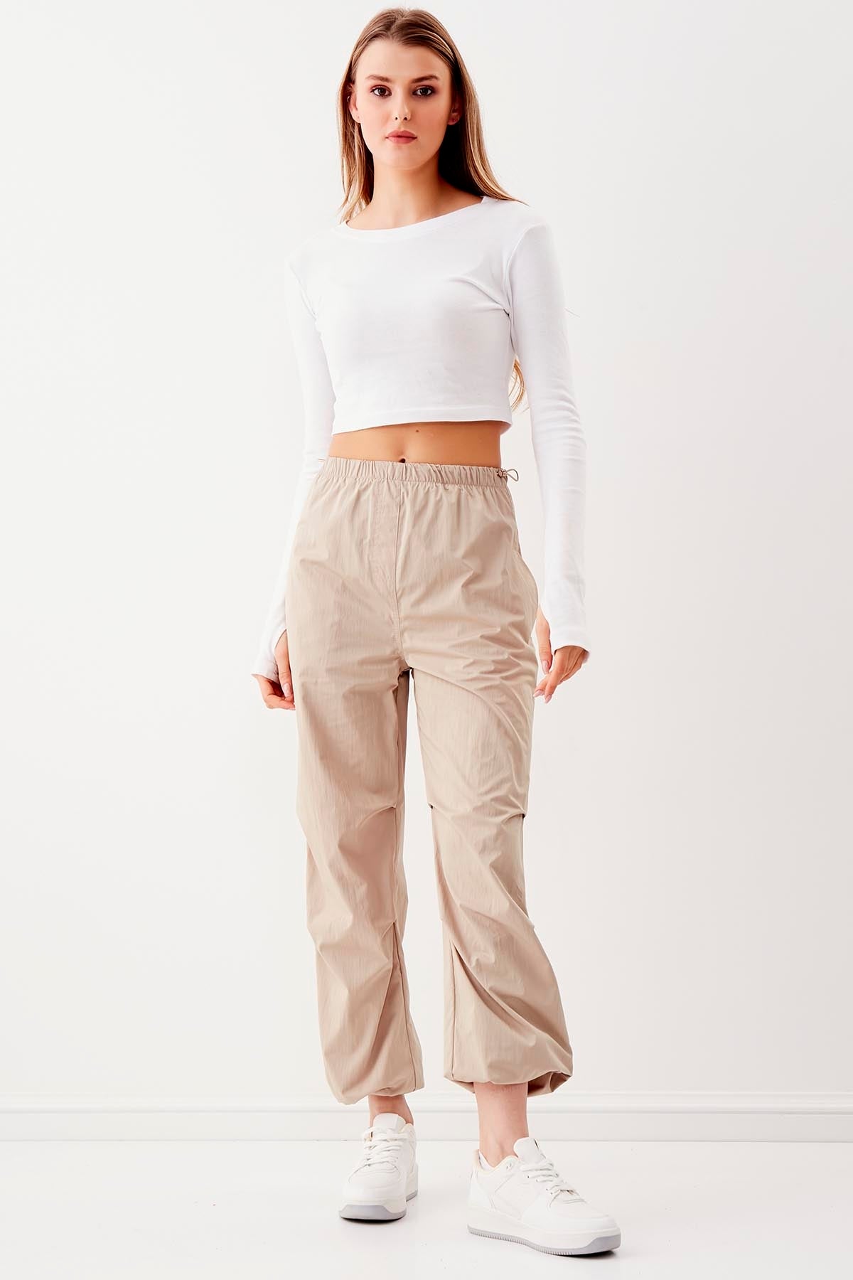 RUBBER-DETAILED PARACHUTE FABRIC TROUSERS