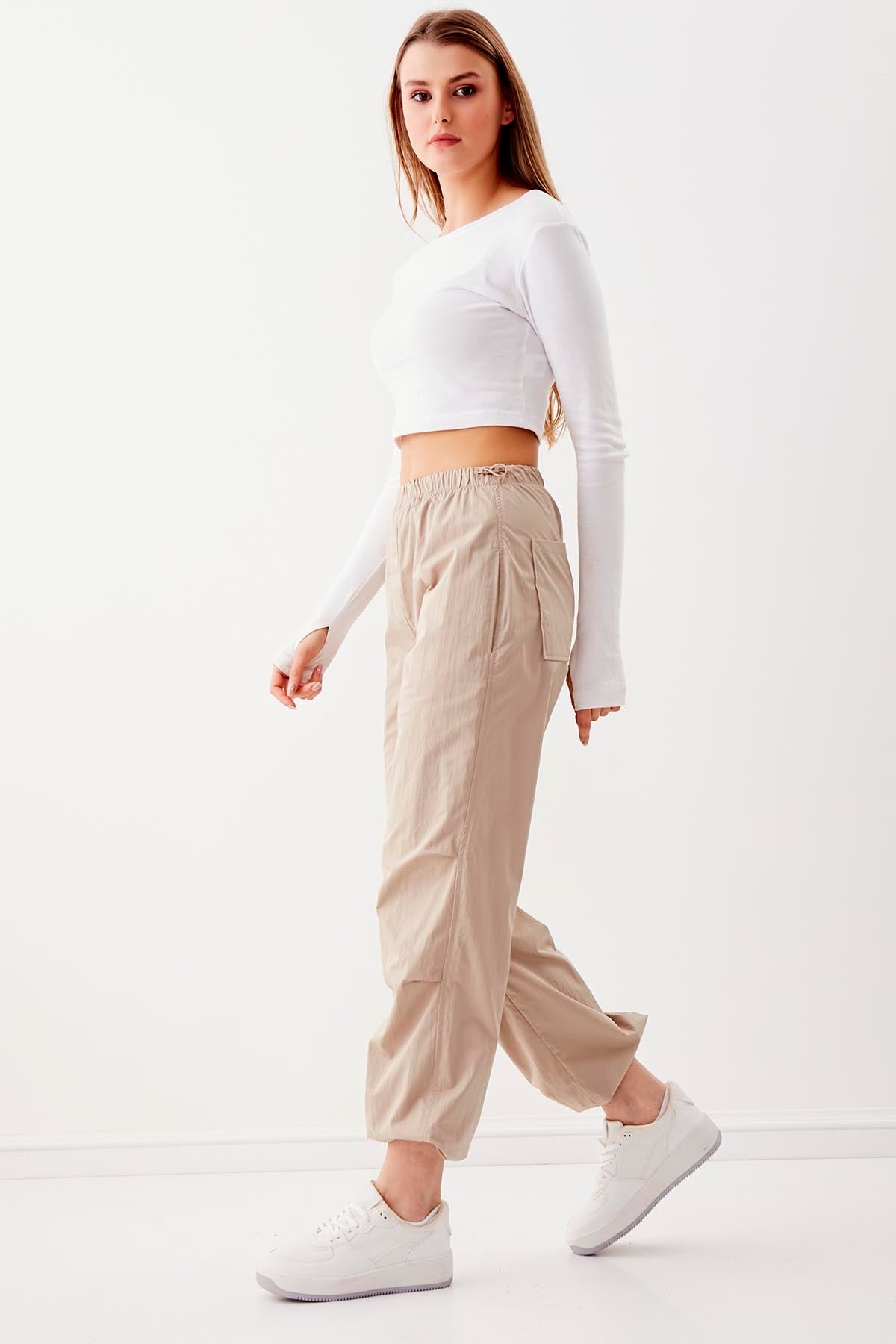 RUBBER-DETAILED PARACHUTE FABRIC TROUSERS