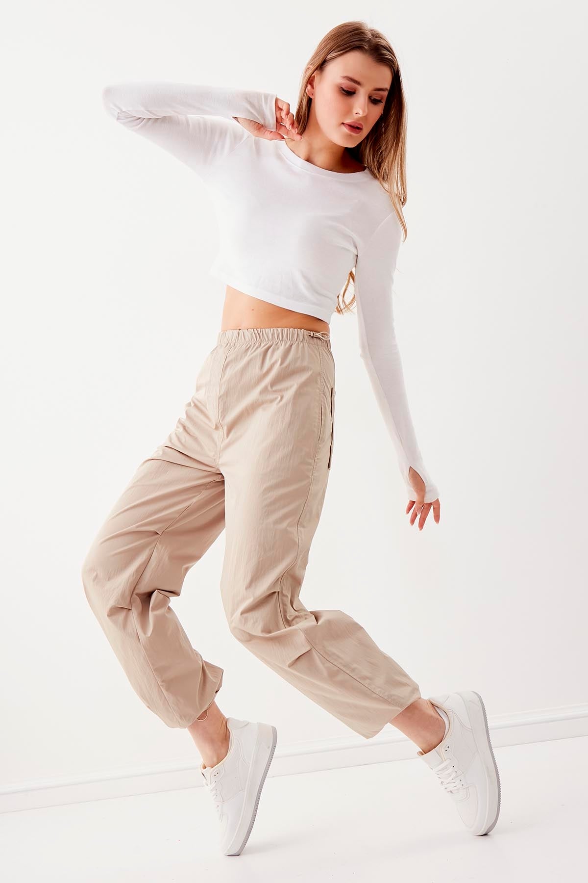 RUBBER-DETAILED PARACHUTE FABRIC TROUSERS
