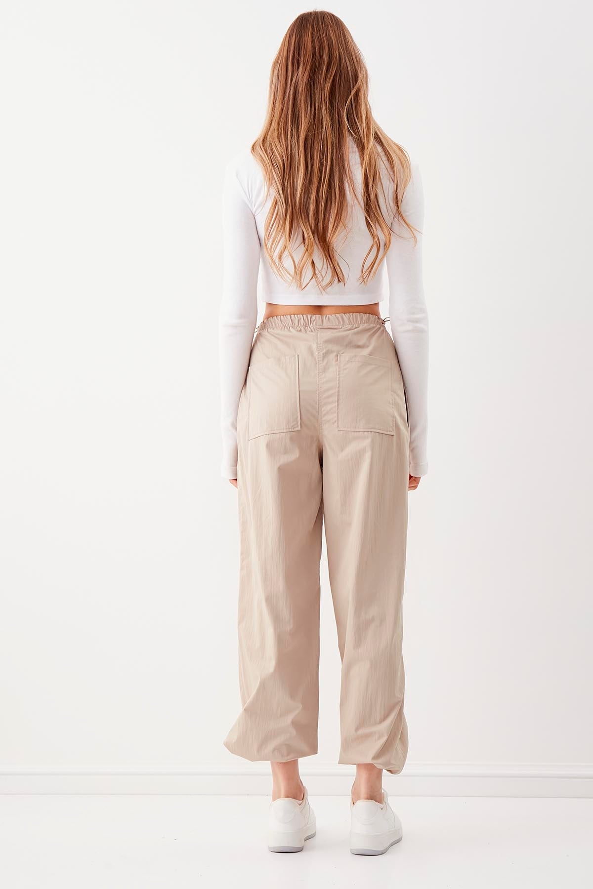 RUBBER-DETAILED PARACHUTE FABRIC TROUSERS
