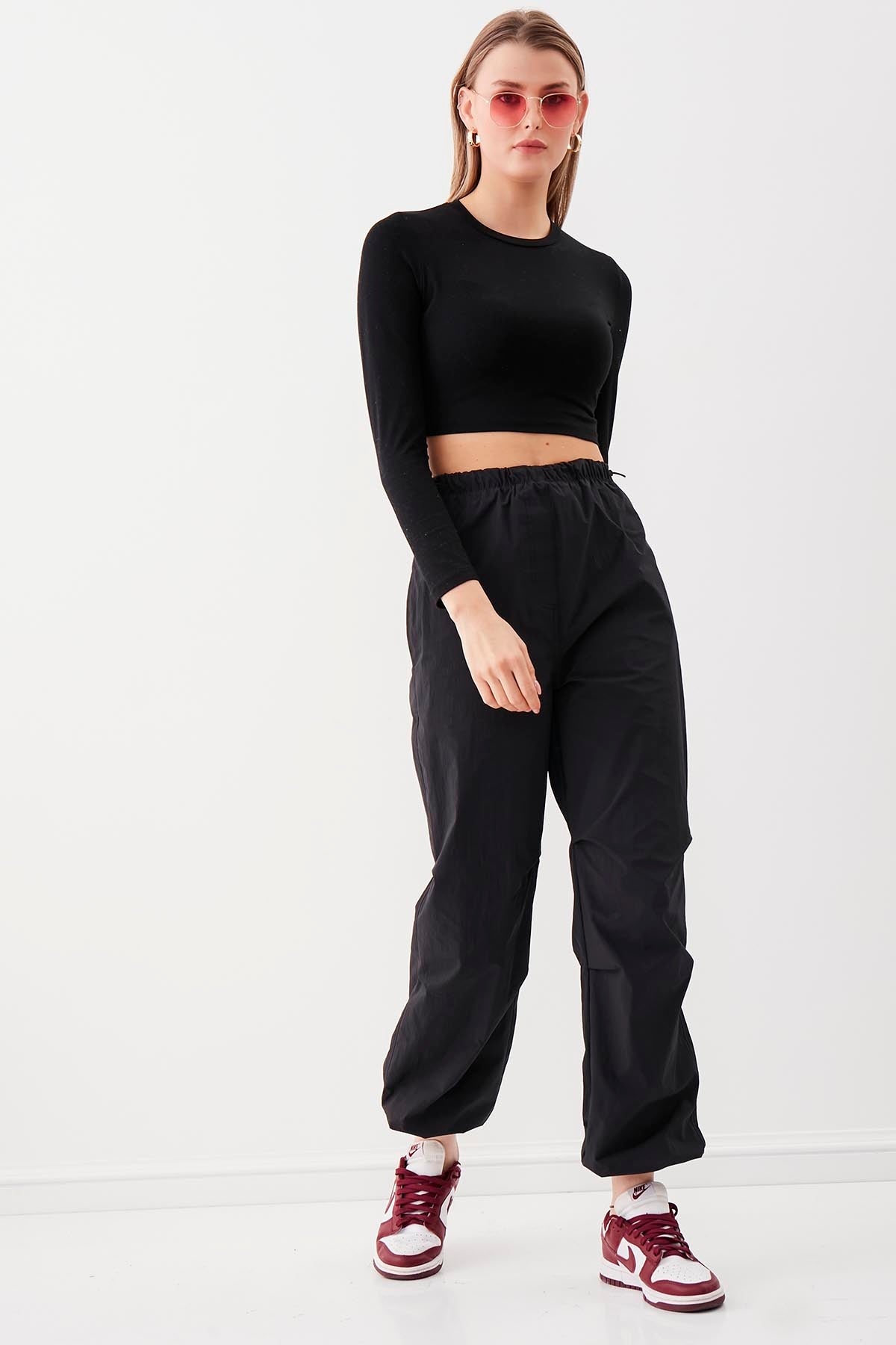 RUBBER-DETAILED PARACHUTE FABRIC TROUSERS