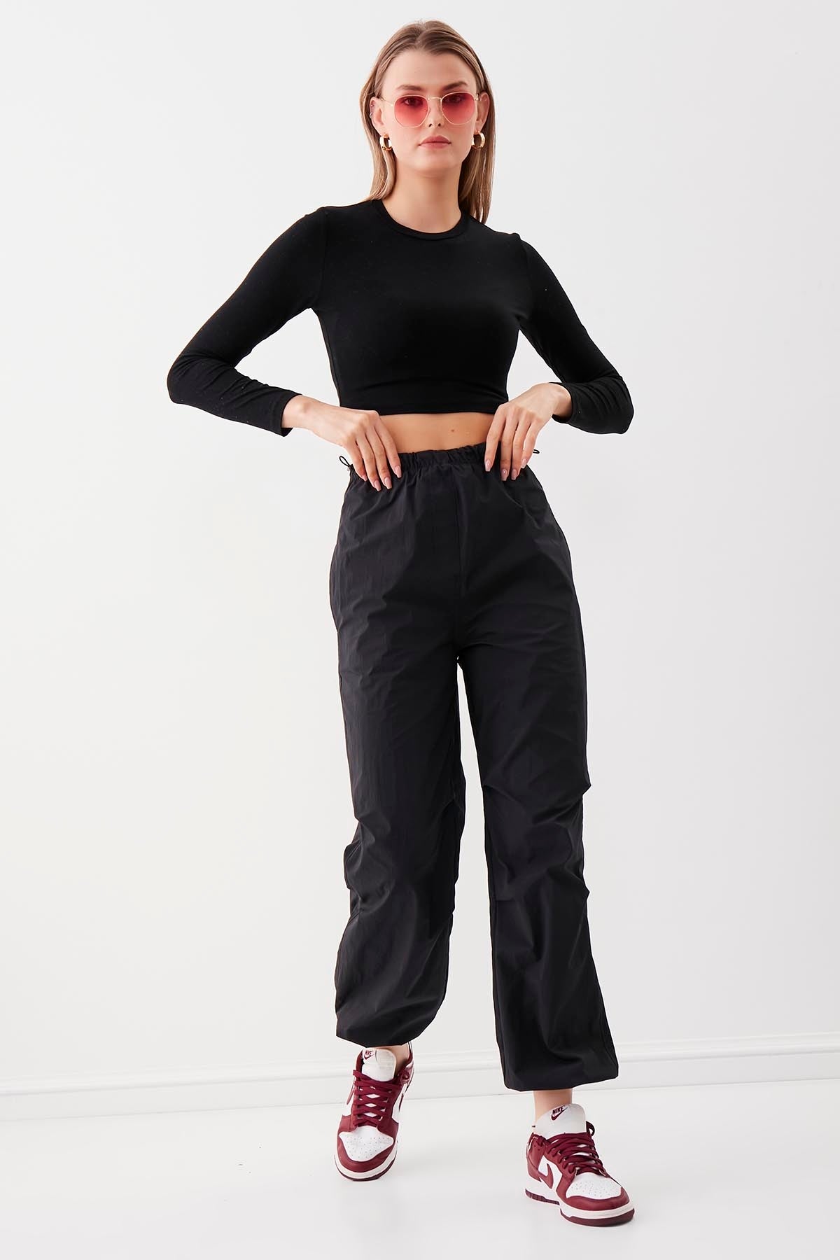 RUBBER-DETAILED PARACHUTE FABRIC TROUSERS
