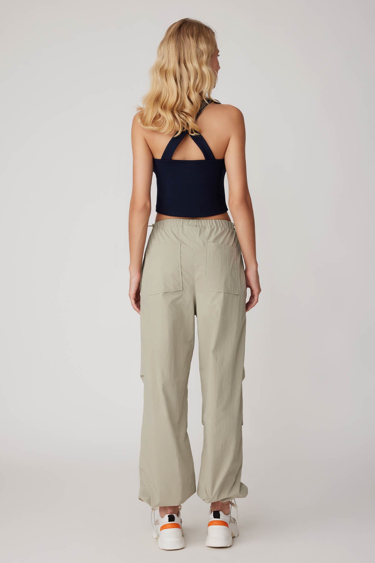 RUBBER-DETAILED PARACHUTE FABRIC TROUSERS