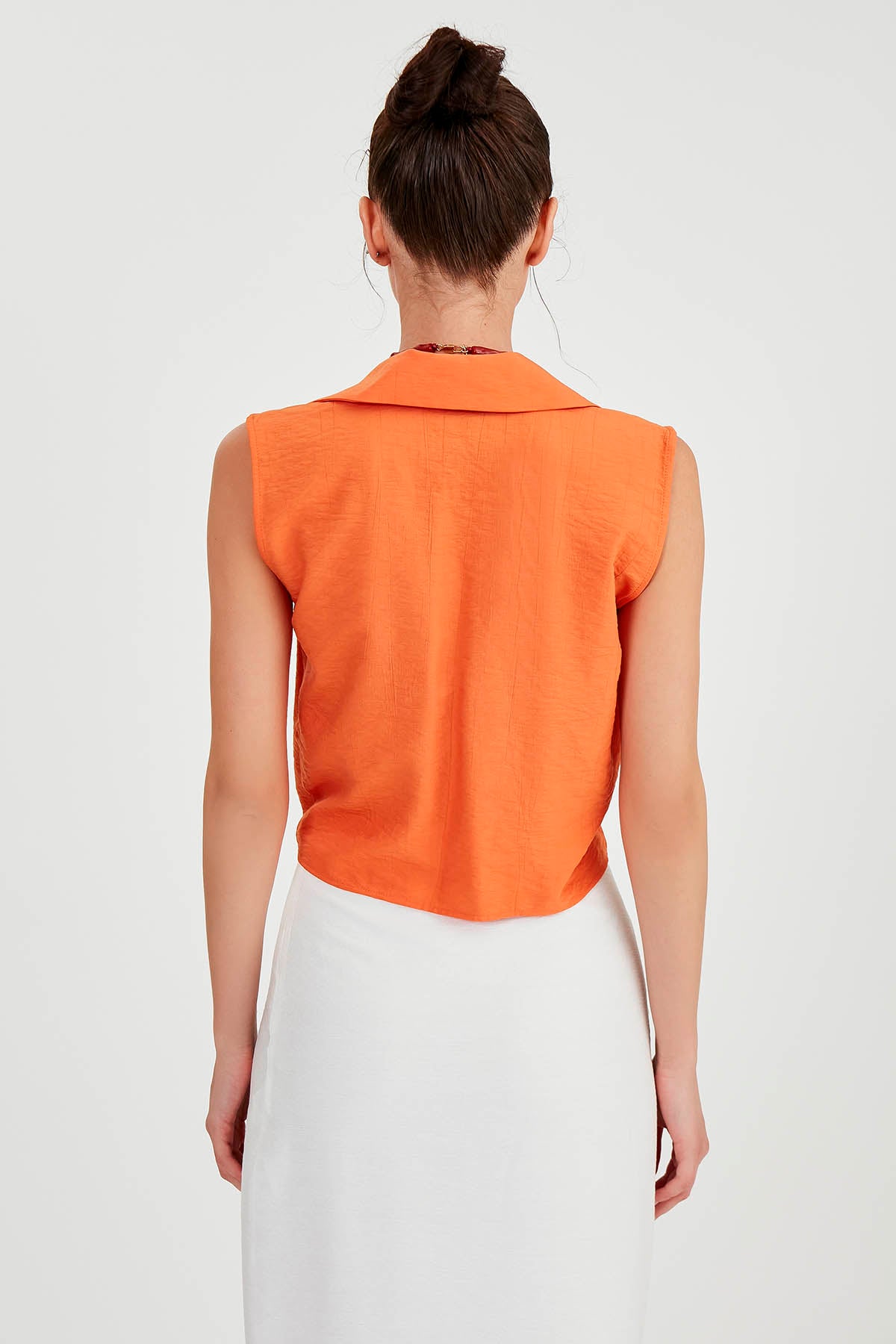 SLEEVELESS BLOUSE