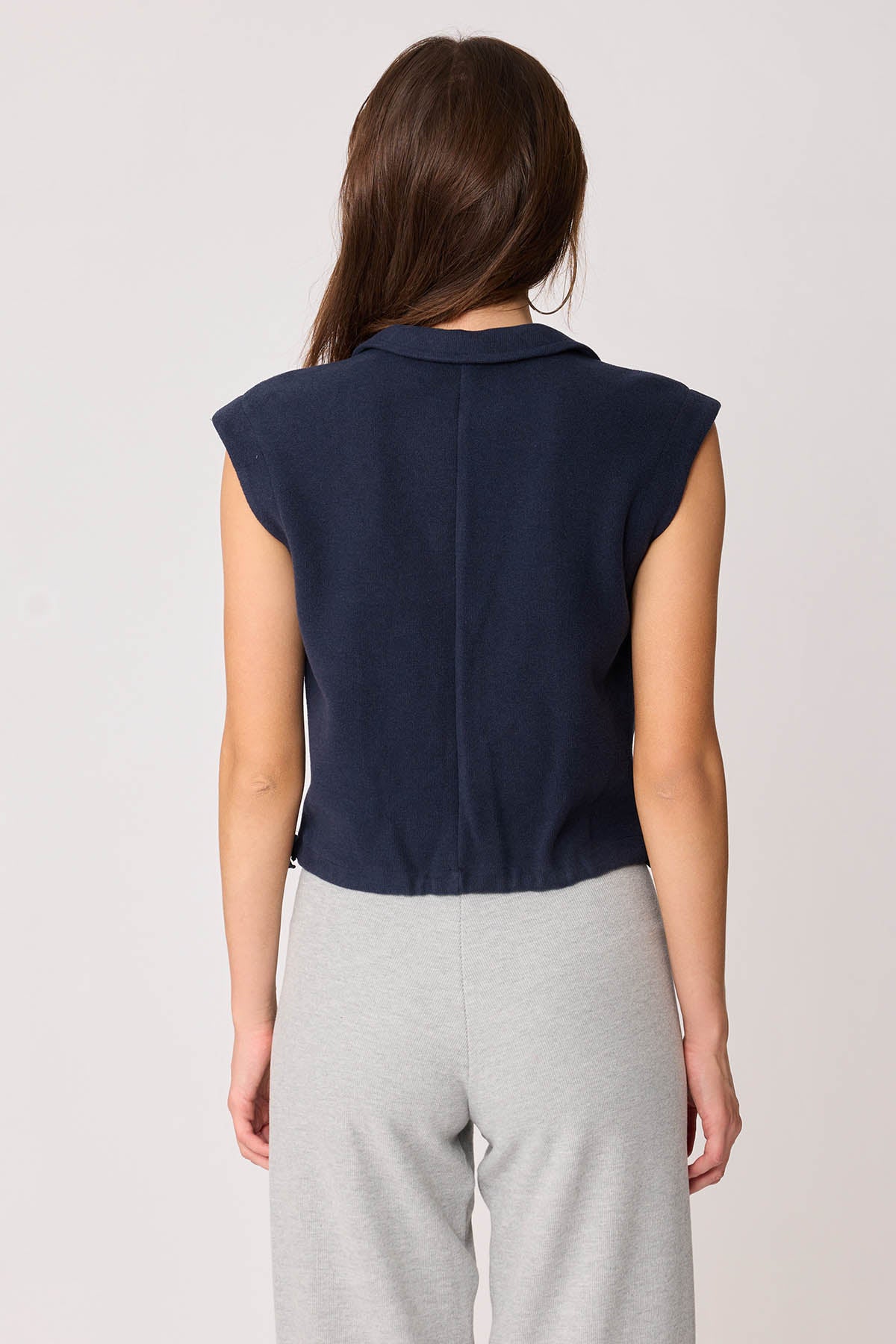 KNITTED VEST WITH WEDGE BUTTONS
