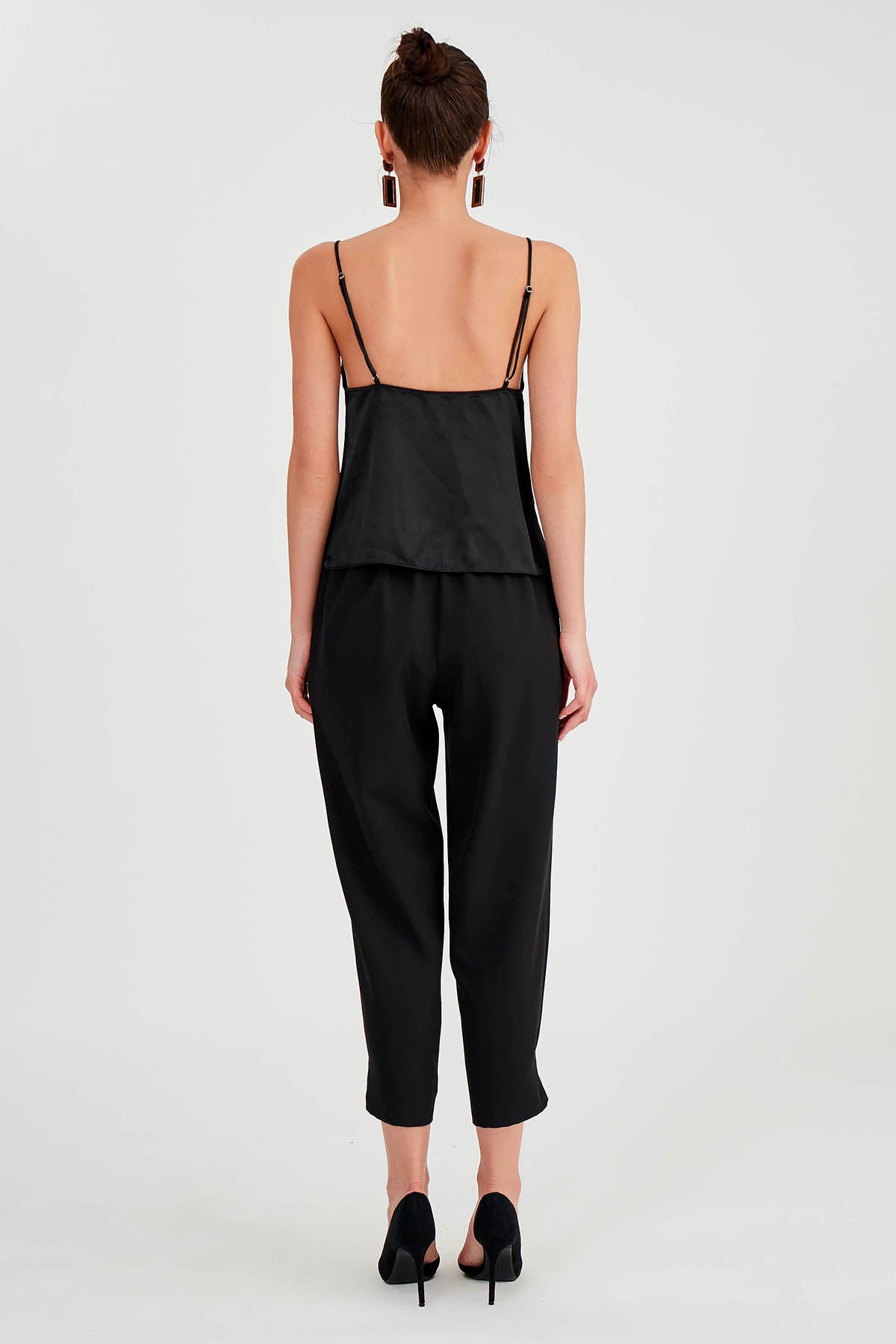TROUSERS WITH ZIPPERED BUTTONS