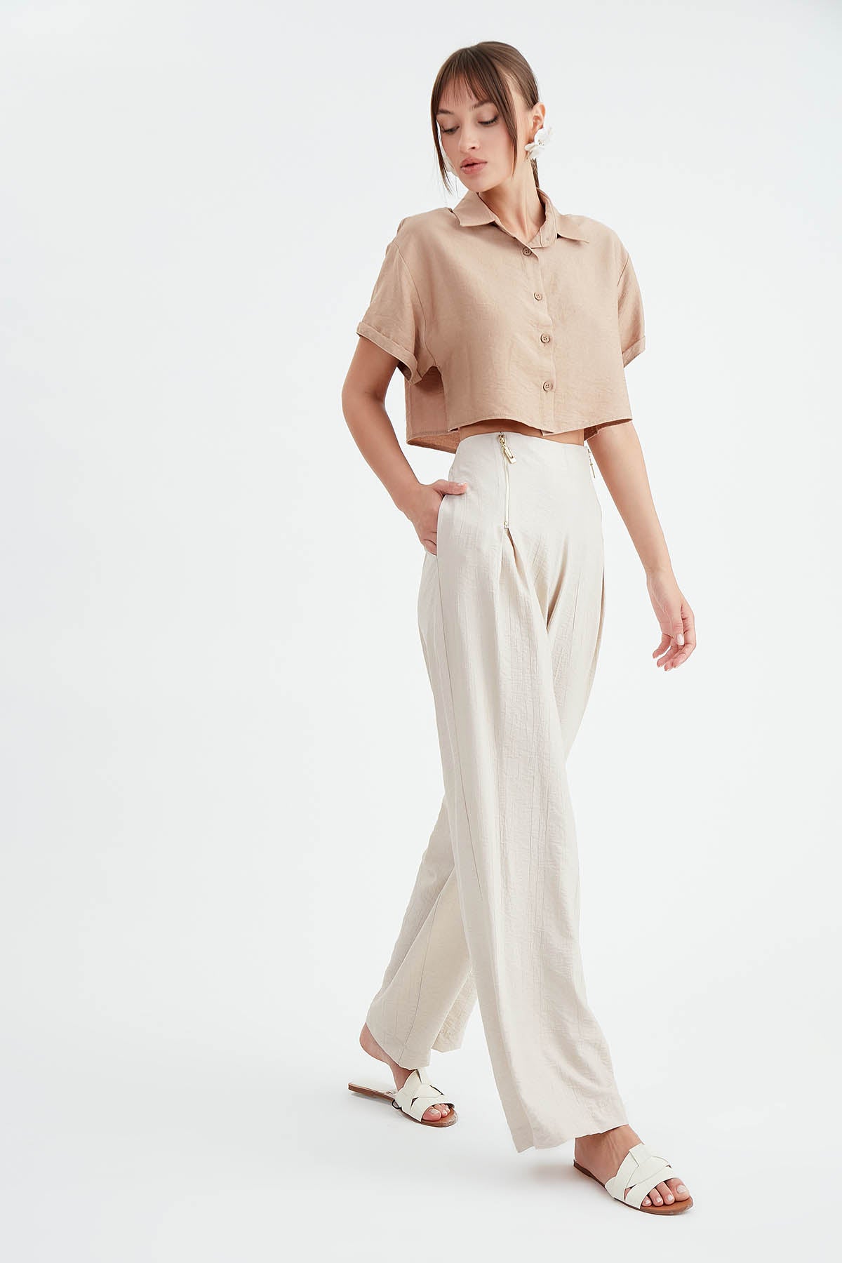 WIDE-ASPECT TROUSERS WITH ZIPPERED FRONT