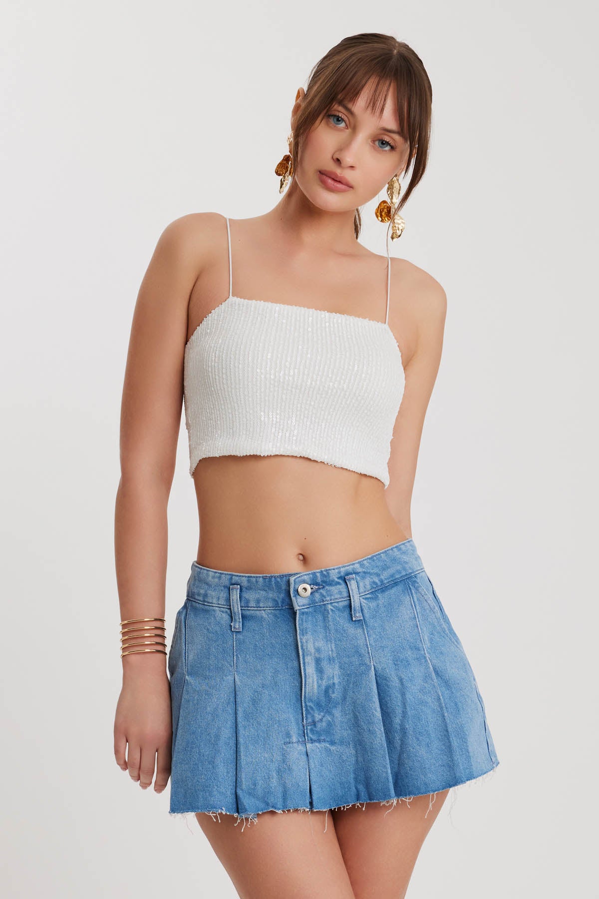 PLEATED DENIM MINI-SKIRT