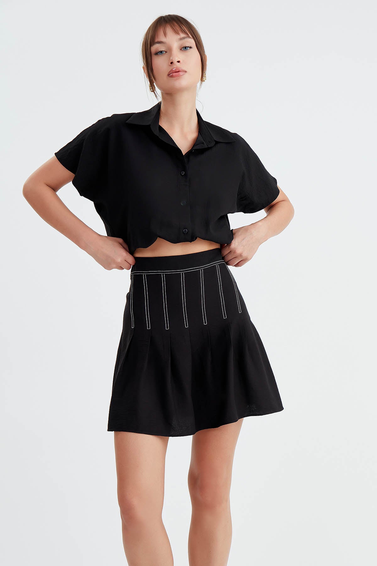 PLEATED MINI-SKIRT