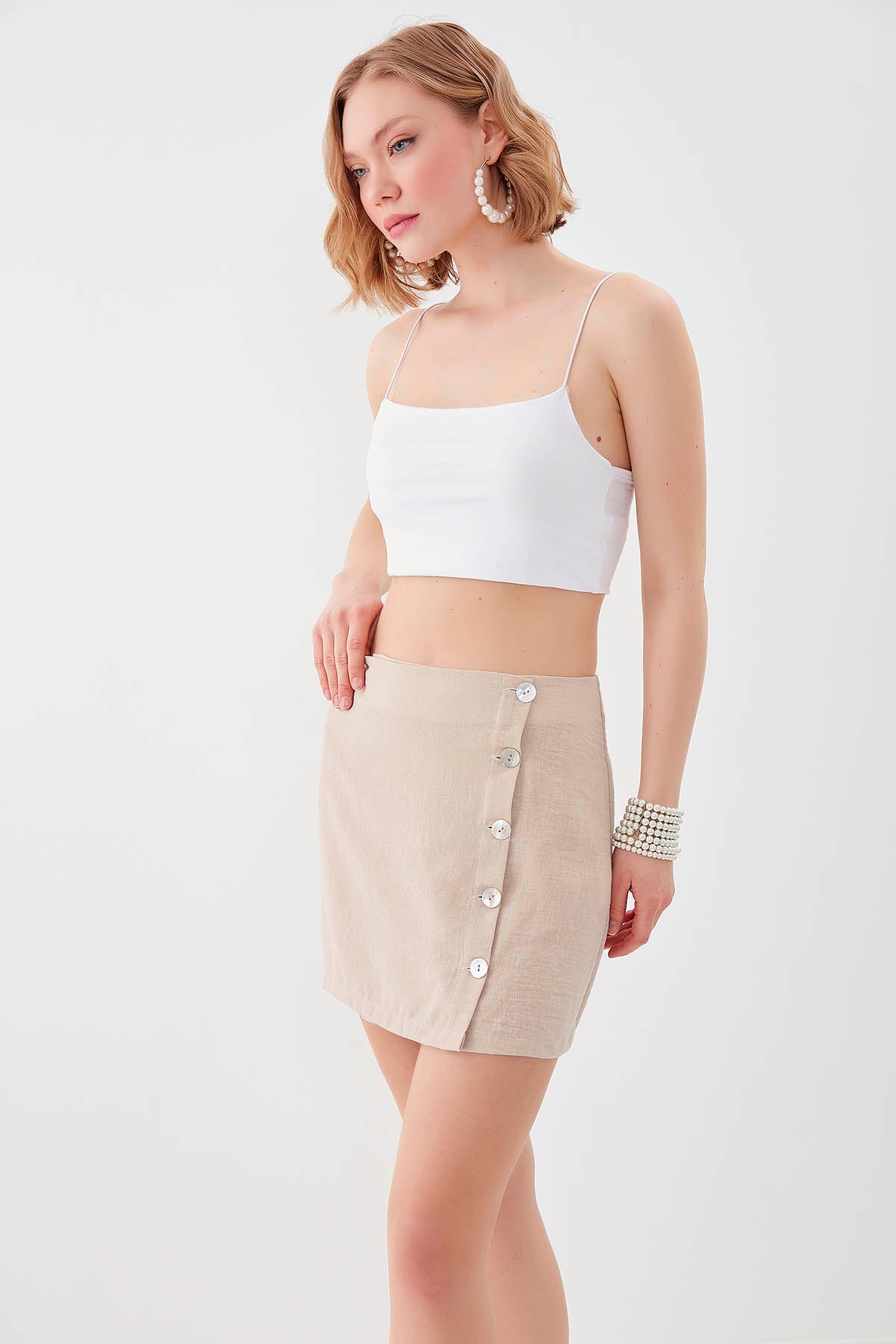 PSORIASIS-BUTTON VISCOSE LINEN MINI-SKIRT