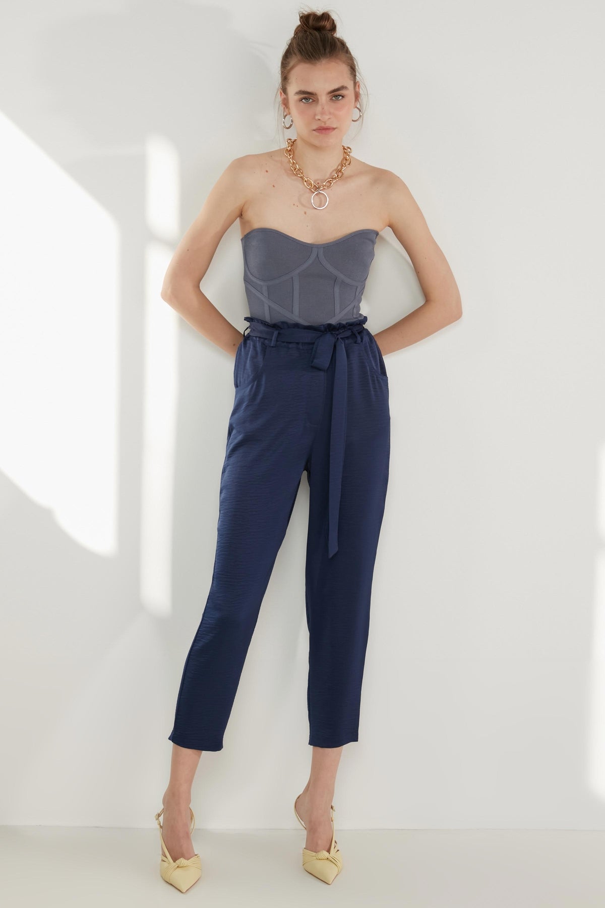 HIGH-WAIST JAGGED CROP TROUSERS