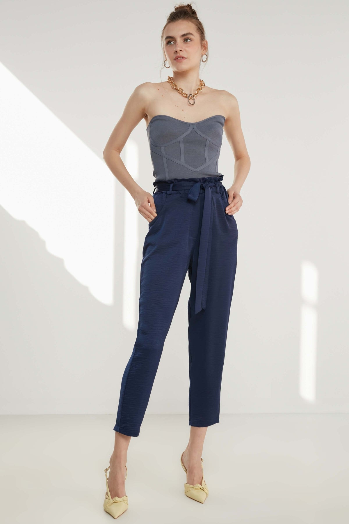 HIGH-WAIST JAGGED CROP TROUSERS