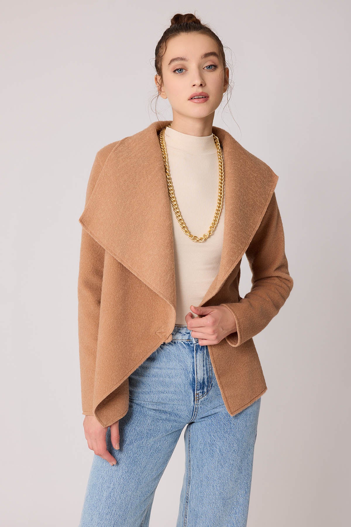 ASYMMETRIC JACKET WITH BUCKLE BINDING