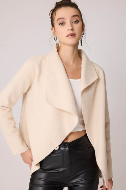 ASYMMETRIC JACKET WITH BUCKLE BINDING