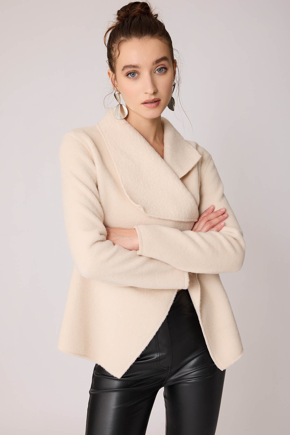 ASYMMETRIC JACKET WITH BUCKLE BINDING