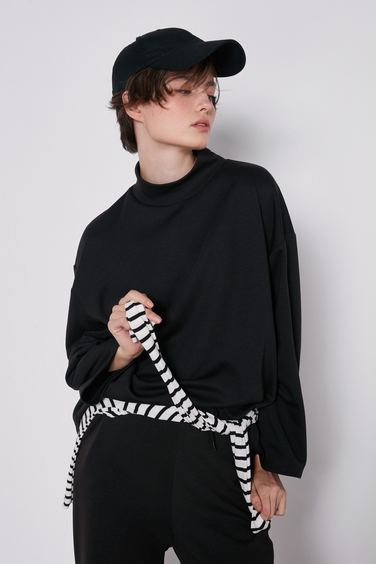 ASYMMETRICAL UPRIGHT COLLAR LOOSE FIT BLOUSE