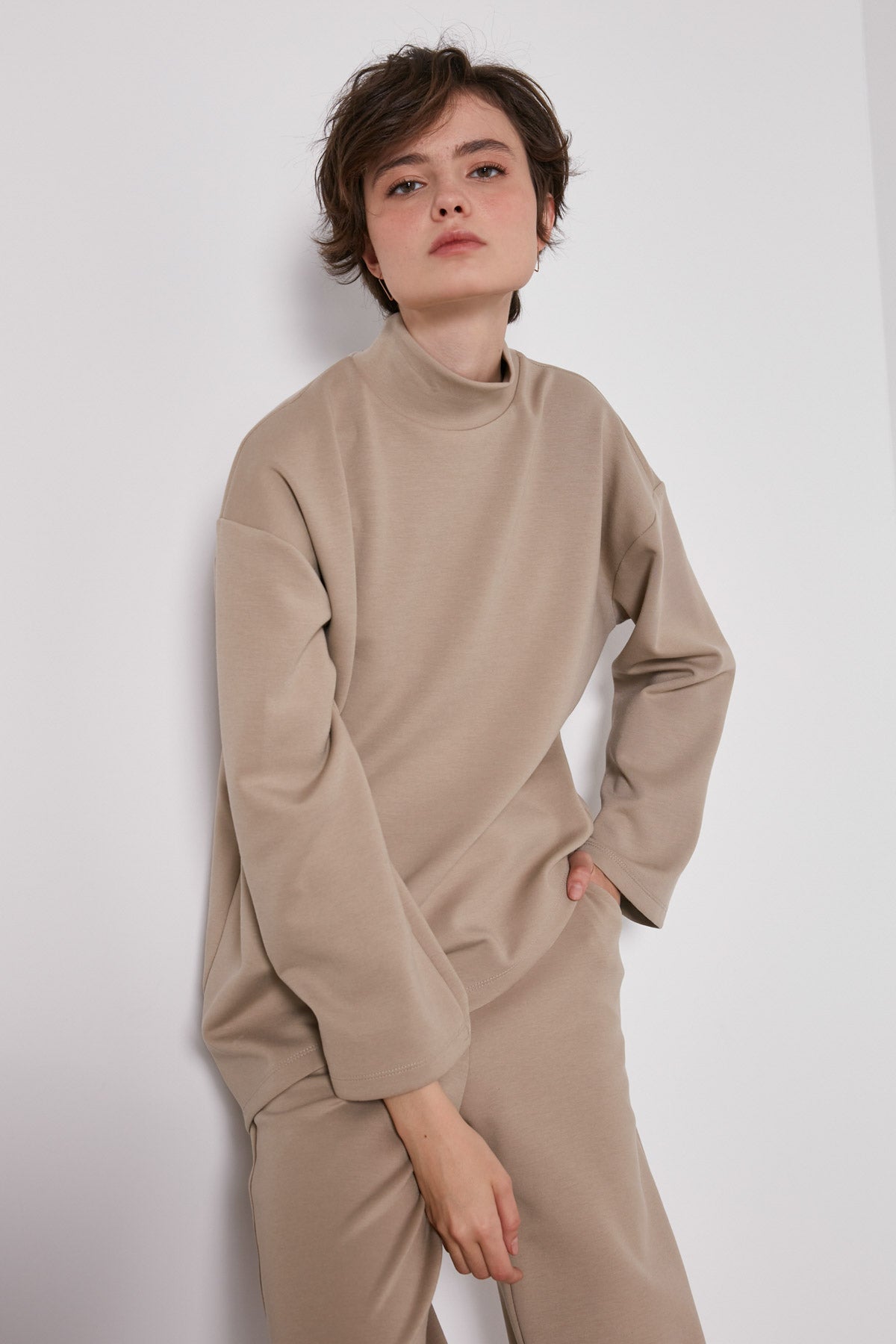 ASYMMETRICAL UPRIGHT COLLAR LOOSE FIT BLOUSE