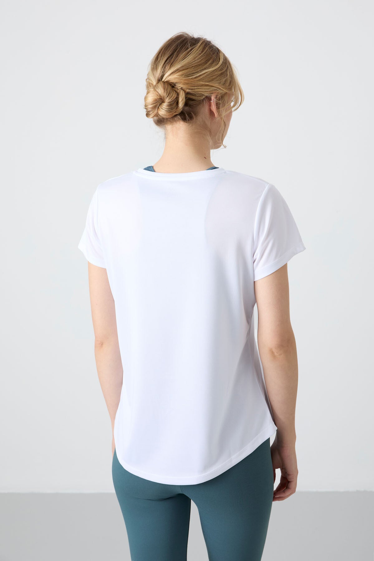 White Polyester Breathable Textured Thin Flexible Standard Fit Performance Women's T-Shirt - 97283