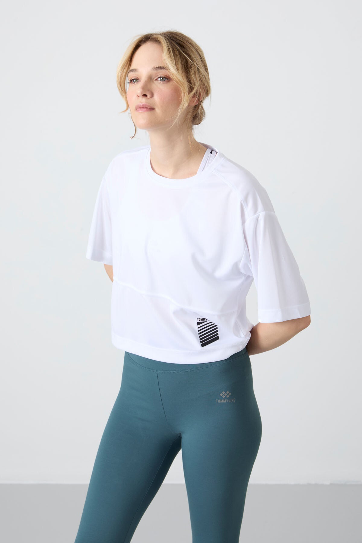 White Polyester Breathable Textured Thin Flexible Oversize Fit Performance Women's T-Shirt - 97284