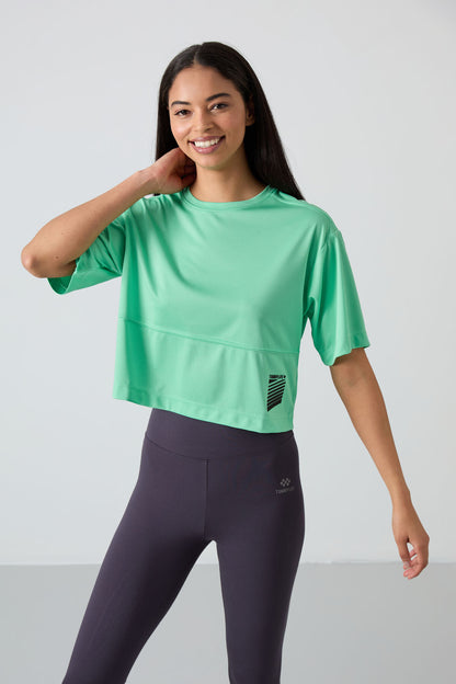 Mint Green Polyester Breathable Textured Thin Flexible Oversize Fit Performance Women's T-Shirt - 97284