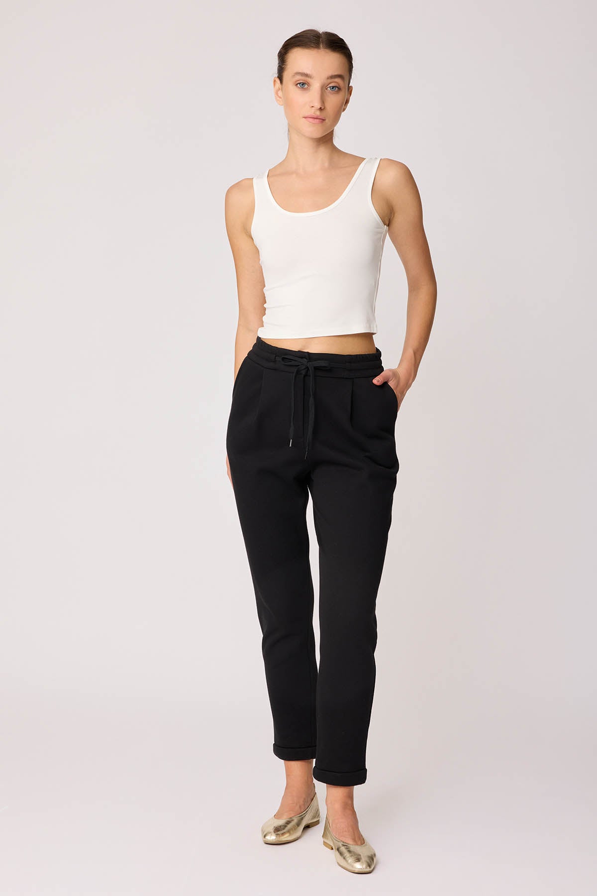 TRACKSUIT TROUSERS WITH LACED POCKETS