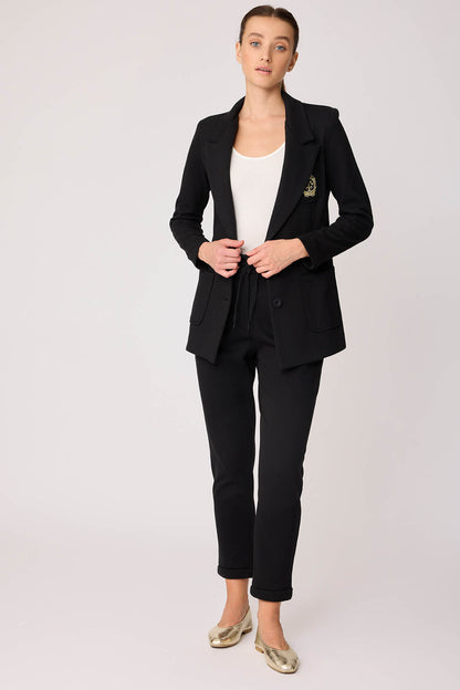 TRACKSUIT TROUSERS WITH LACED POCKETS