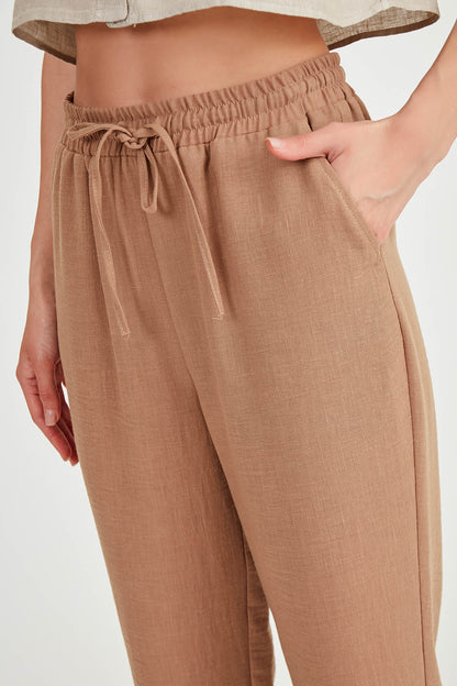 COMFORTABLE TROUSERS WITH LACED POCKETS