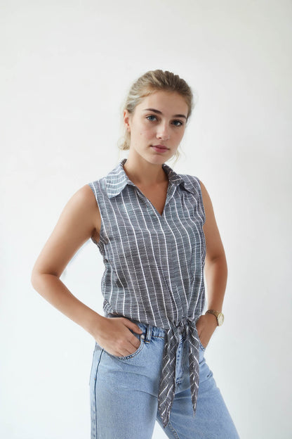 SLEEVELESS SHIRT WITH WAIST LINKED LINES