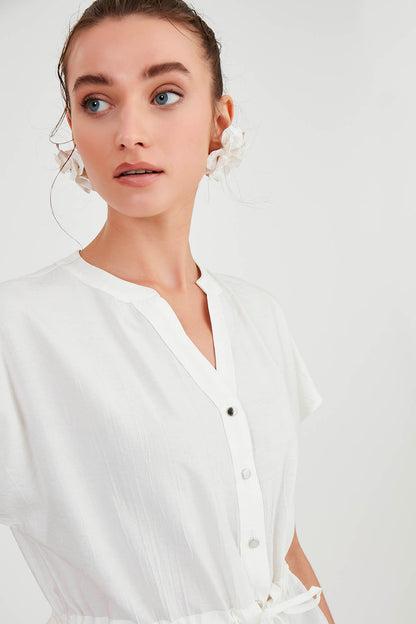 LOOSE BLOUSE WITH RUCKLEBAR BUTTONS