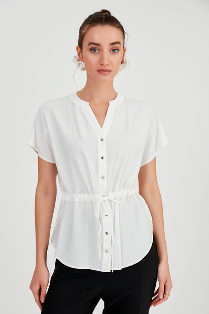 LOOSE BLOUSE WITH RUCKLEBAR BUTTONS