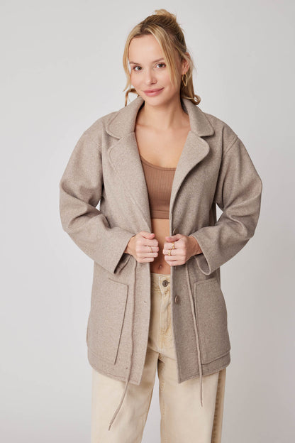 JACKET WITH WAIST-TWISTED FRONT BUTTON POCKET