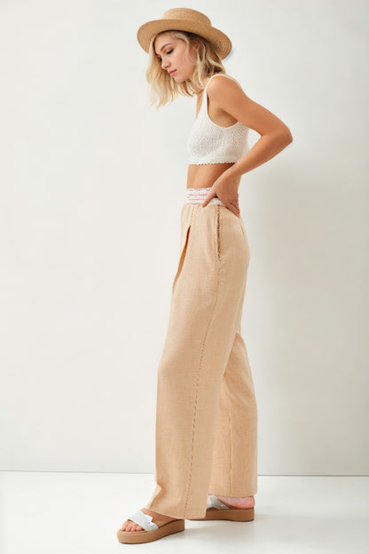 RIBBON-PATTERNED WIDE-LEG TROUSERS WITH ELASTANE WAIST