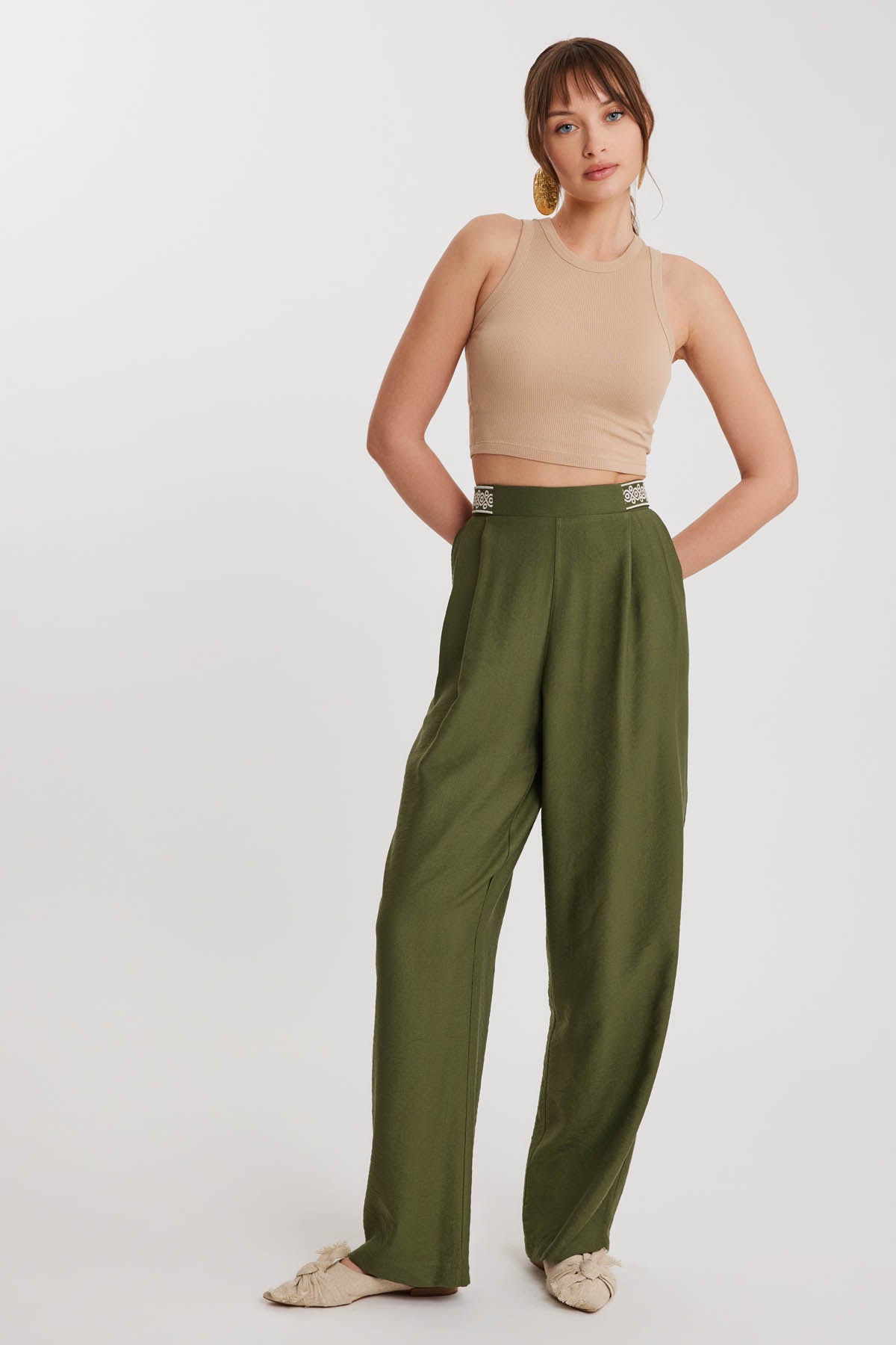PLEATED TROUSERS WITH ETHNIC PATTERNED WAIST