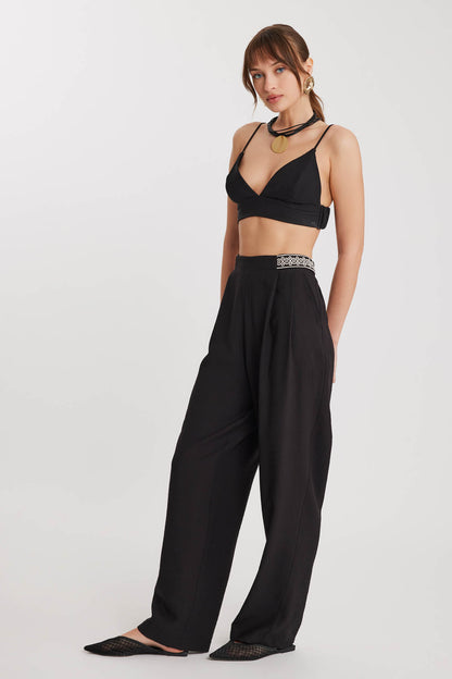 PLEATED TROUSERS WITH ETHNIC PATTERNED WAIST