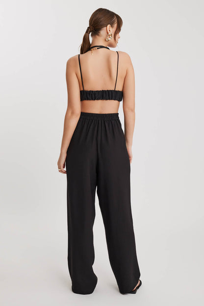 PLEATED TROUSERS WITH ETHNIC PATTERNED WAIST