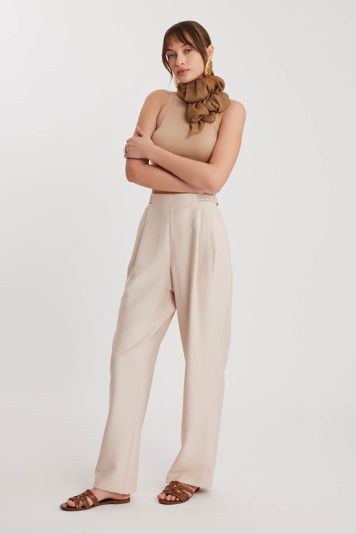 PLEATED TROUSERS WITH ETHNIC PATTERNED WAIST