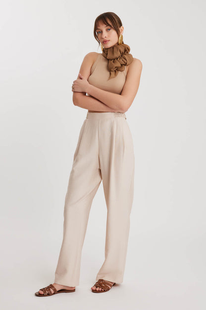 PLEATED TROUSERS WITH ETHNIC PATTERNED WAIST