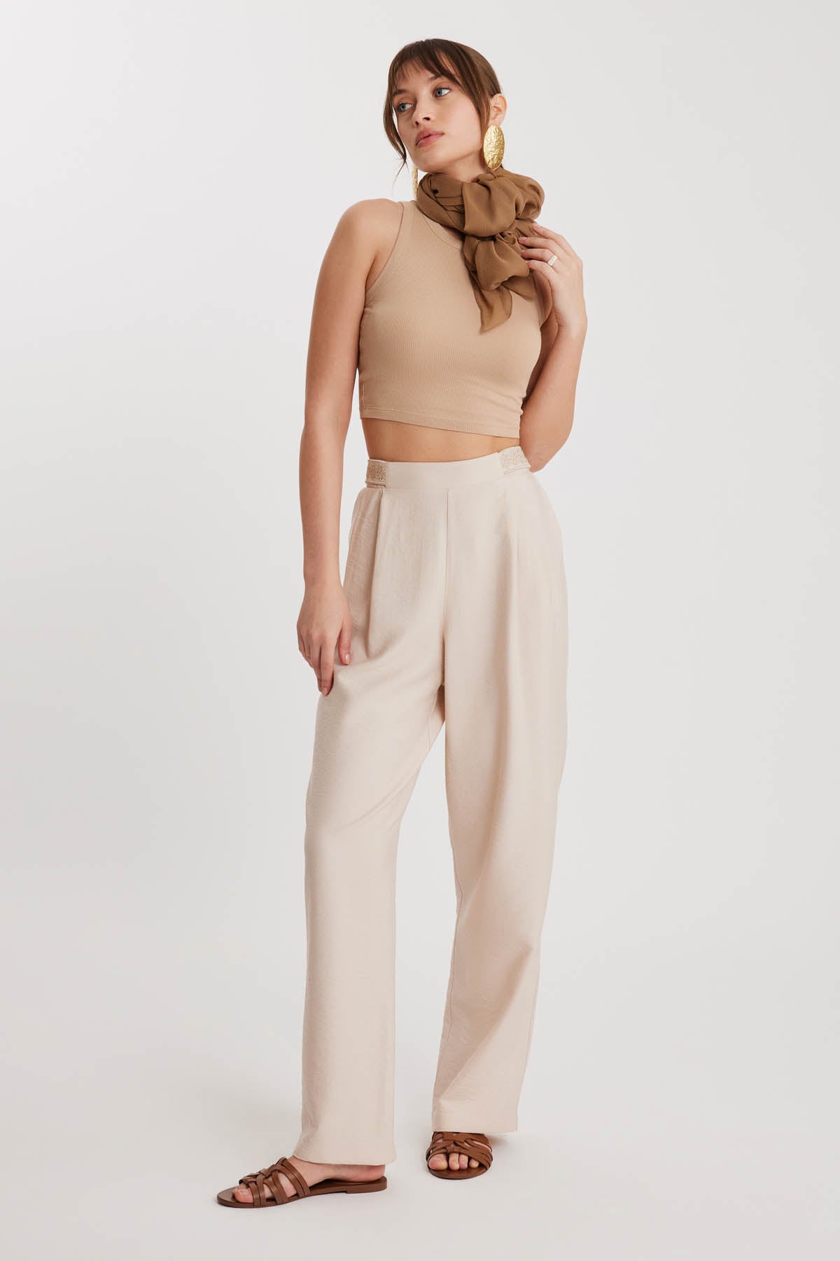 PLEATED TROUSERS WITH ETHNIC PATTERNED WAIST