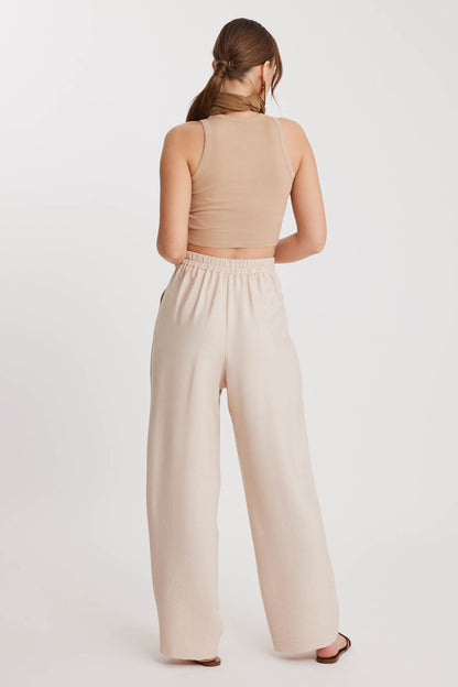 PLEATED TROUSERS WITH ETHNIC PATTERNED WAIST