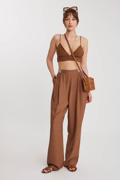 PLEATED TROUSERS WITH ETHNIC PATTERNED WAIST