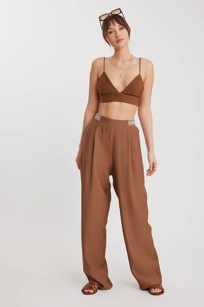 PLEATED TROUSERS WITH ETHNIC PATTERNED WAIST