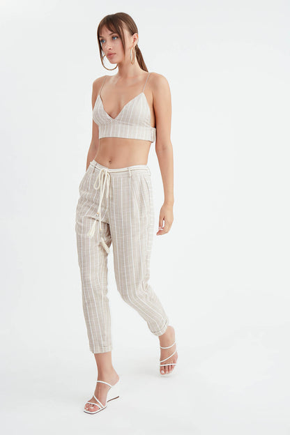 ARCHED CROP TROUSERS